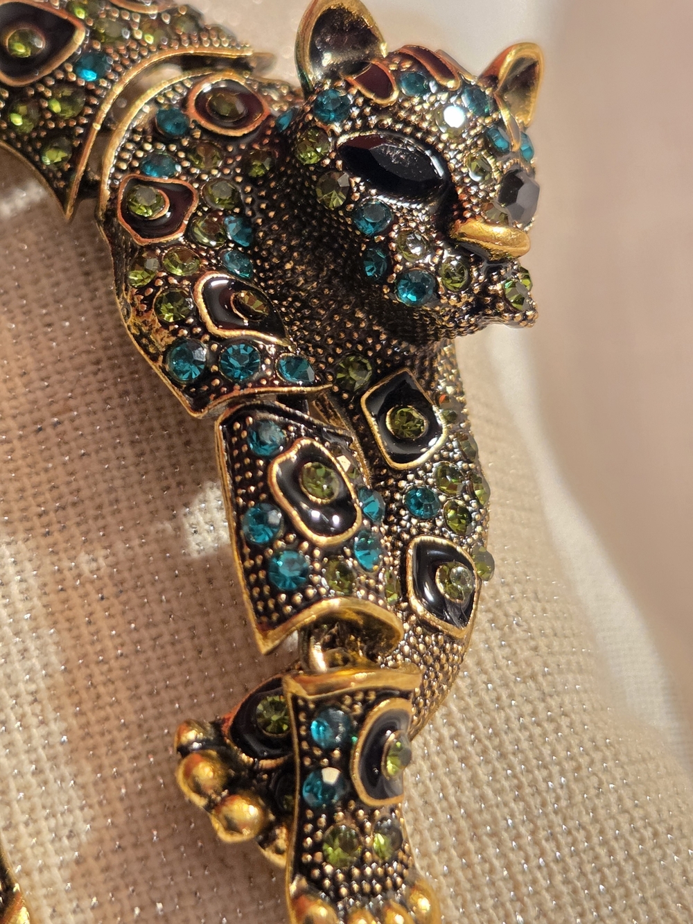 Gold-Tone Panther Pendant with Teal and Olive Crystal Accents